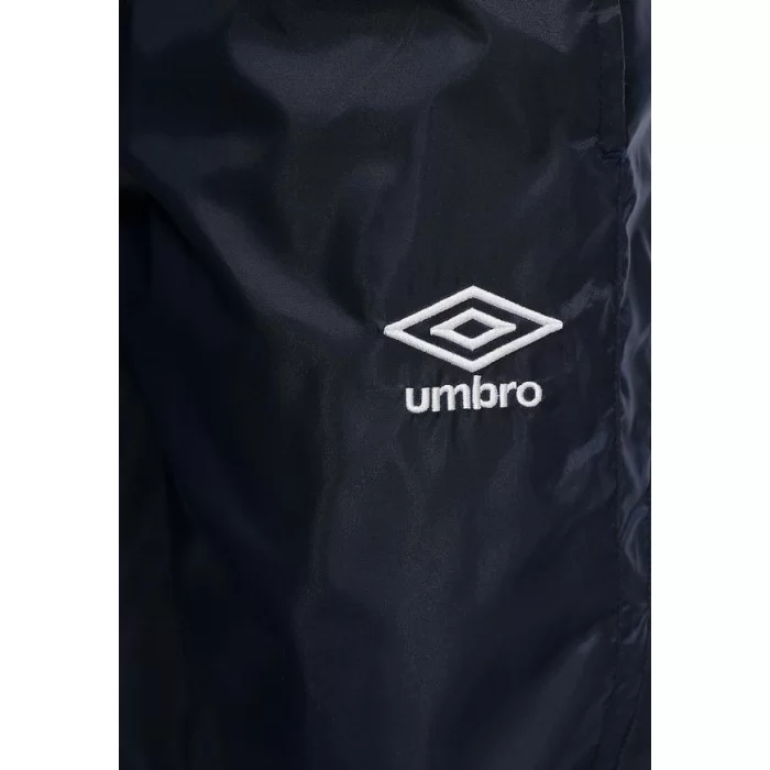 Реальное фото Брюки ветрозащитные Umbro Uniform II Shower Pant т.син/бел/бел 423014/911 от магазина СпортСЕ