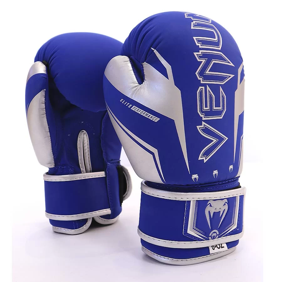 Реальное фото Перчатки боксерские Venum Elite EVO (PK) детские синий кож/зам от магазина СпортСЕ