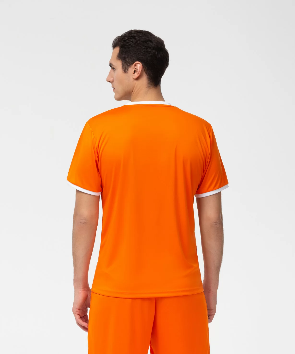 Реальное фото Футболка футбольная CAMP Origin, оранжевый/белый от магазина СпортСЕ